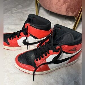 Air Jordan orange and Black High-Top Sneakers